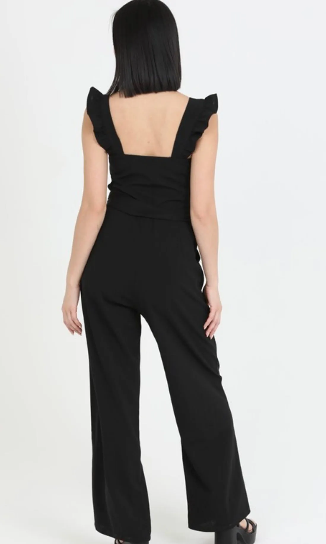 Cyndra Black Notch Neck Ruffle Strap Jumpsuit With Pockets